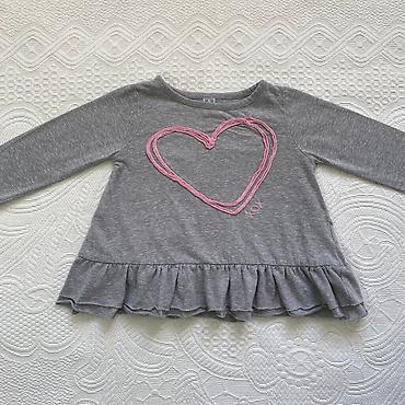 tn kids: Bluza-tunika za bebe
Nije puno nosena,u ok stanju
Velicina 12 mes — 3