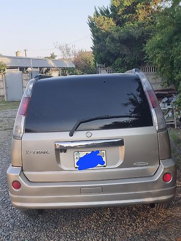 Транспорт: Nissan X-Trail: 2 л | 2004 г. Универсал — 4