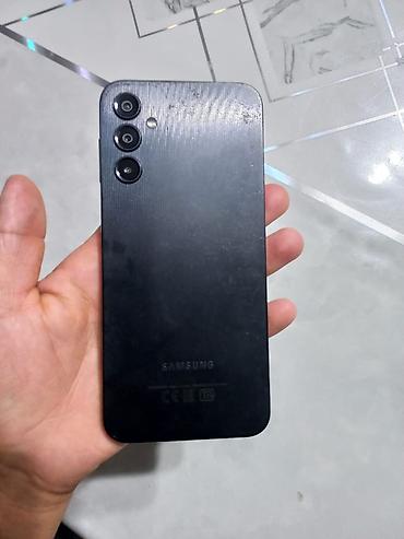 redmi 13 note pro: Смартфон Samsung (серия Galaxy A) в черном цвете. Ключевые — 1