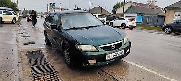 Mazda 323: 2003 г., 1.6 л, Механика, Бензин, Хэтчбэк
