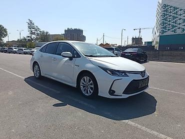 crown 2015: Toyota Corolla: 2021 г., 1.8 л, Вариатор, Гибрид, Седан — 5