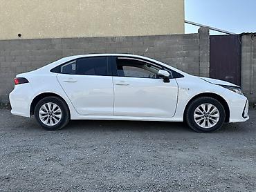 byd e2 2021: Toyota Corolla: 2021 г., 1.8 л, Вариатор, Гибрид, Седан — 2