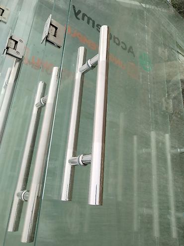 domax qapi: 10luq təmpər şüşə qapilar 9 əd var. Ölçüləri 206 sm x 89 sm. Üstündə — 2