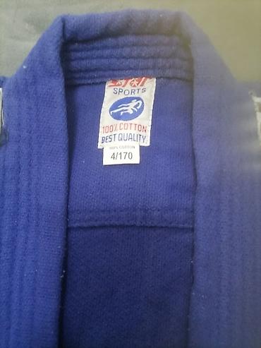 Kişi geyimləri: Məhsul: Judo/Gi üst geyimi - Brend: B&J Sports (etiketdə — 2