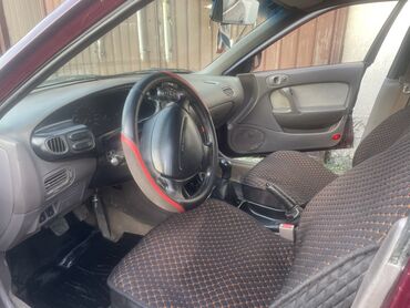продаю или меняю с доплатой мне: Mazda 2: 1994 г., 2 л, Механика, Бензин