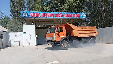 Грузовики: Самосвал КамАЗ оранжевого цвета, колесная формула 6×4. Металлический — 11