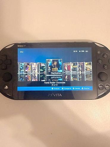 PS Vita (Sony Playstation Vita): Playstation vita ideal veziyyetdedir. Hec bir problemi yoxdu. Ciziqi — 4