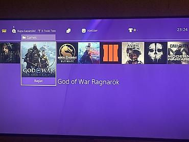 ps4 oyun diskləri: - PlayStation 4 Pro oyun konsolu, üst paneldə xüsusi Joker temalı — 4