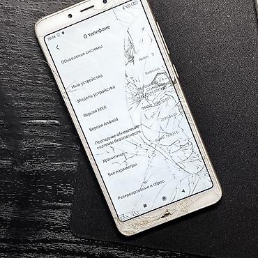 Другие мобильные телефоны: Два телефона. 1) Кнопочный раскладной телефон NTT Docomo (японская — 13