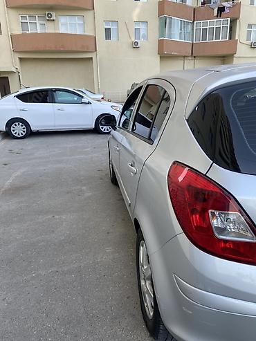 Opel: Opel Corsa CDTI, gümüşü rəng, 5 qapılı hetçbek. Texniki — 3