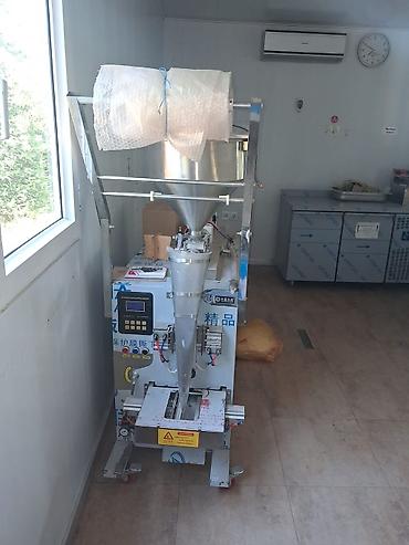 Paketləmə aparatları: XUANTENG XT-30 – Avtomatik maye qablaşdırma maşını - Model: XT-30 - — 7