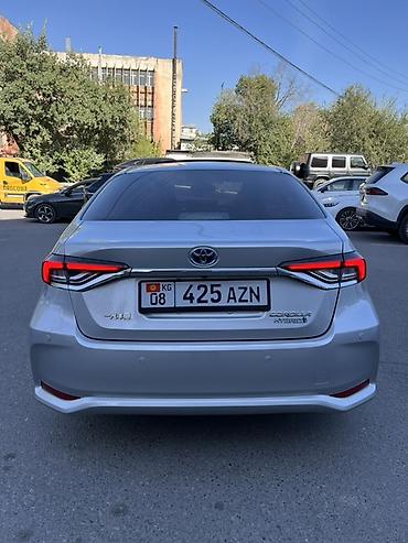 селика: Toyota Corolla: 2020 г., 1.8 л, Автомат, Гибрид, Седан — 5