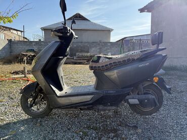 купить электромотоцикл в бишкеке: Электроскутер (серый) Описание: - Городской электроскутер с широкой