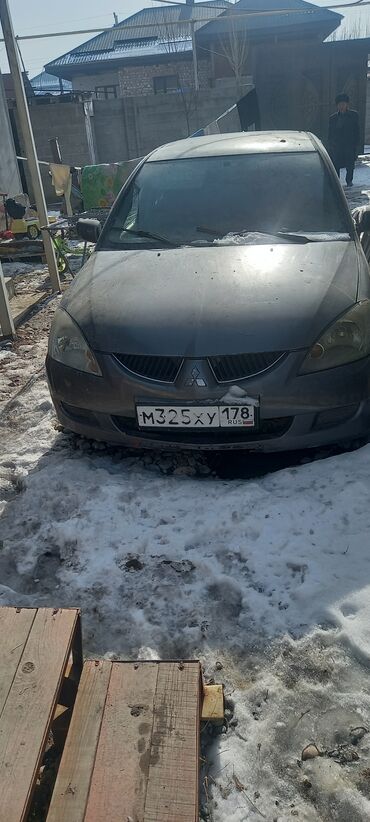 Mitsubishi: Mitsubishi Lancer: 2005 г., 1.3 л, Механика, Бензин, Седан