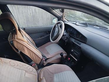 кузов некся: Kia Avella: 1996 г., 1.3 л, Механика, Бензин, Хэтчбэк — 5