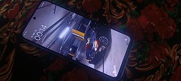 машина чихол: Redmi, Redmi 12, Б/у, 256 ГБ, цвет - Голубой, 2 SIM — 1