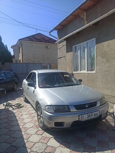 Mazda: Mazda 323: 1999 г., 1.5 л, Механика, Бензин, Седан