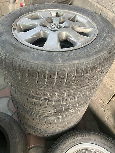 динам: Комплект автомобильных колес и шин. Состав: - Литые диски Toyota — 4