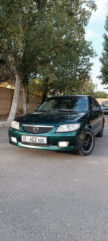 мазда 626 1986: Mazda 323: 1999 г., 1.5 л, Механика, Газ, Хэтчбэк