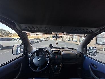 Fiat: Fiat Doblo (mavi rəng, miniven/furqon gövdə) Xüsusiyyətlər: - Geniş — 9