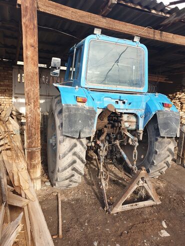 Тракторы МТЗ (Беларус): Трактор МТЗ «Беларус» с кабиной, сзади трехточечная навеска и ВОМ — 2