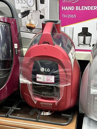 Пылесос LG, мощность 2000 Вт, красный корпус. Основные особенности: -