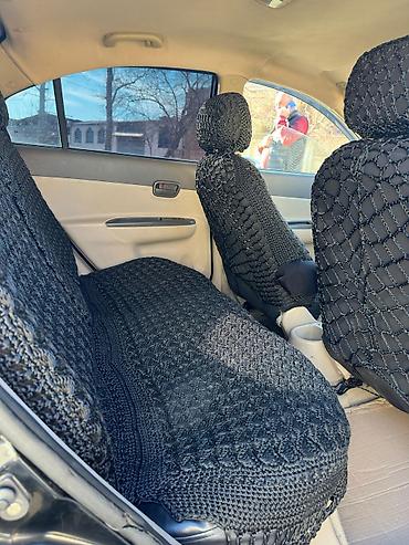 Hyundai: Hyundai Accent sedan – qara rəng Xüsusiyyətlər: - Kuzov: 4 qapılı — 9