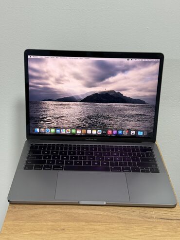купить макбук про 2019: Ноутбук, Apple, 16 ГБ ОЭТ, Intel Core i5, 13.3 ", Колдонулган, Татаал эмес тапшырмалар үчүн, эс тутум SSD
