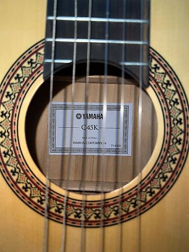 аккордиен: Классическая гитара Yamaha C45K Б/у. Одна струна порвана. В остальном — 2