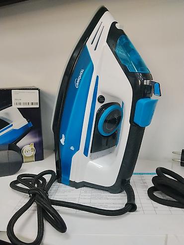 Бытовая техника: Утюг Technomir, Паровой, Керамический, Самоочистка — 1