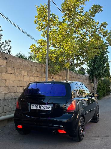 kia rio starter: Kia Rio hatchback, qara rəng, maşın ideal veziyyetdedi maşını — 6