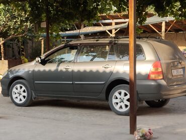 toyota surf 1996: Toyota Corolla: 2004 г., 1.6 л, Механика, Газ, Универсал