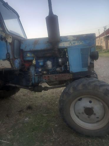 niva siti satilir: Traktor MTZ (Belarus) tipli, 4x4 tam ötürücülü. Mavi rəngli kabinli — 2
