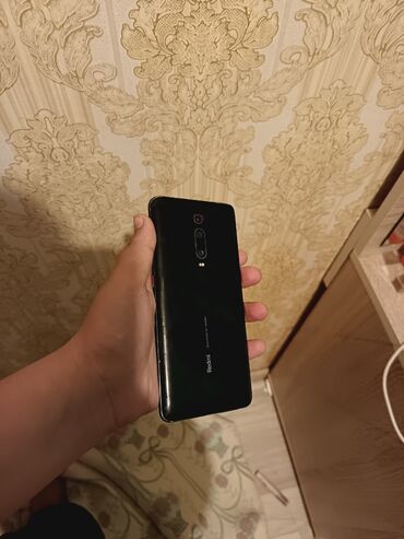 Xiaomi: Xiaomi Xiaomi Mi 9T, 128 GB, rəng - Qara, 
 Zəmanət, Barmaq izi, Simsiz şarj
