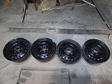 maşın şinləri: Məhsul: 4 ədəd polad disk komplekti Xüsusiyyətlər: - Ölçü: 15" - Bolt — 4