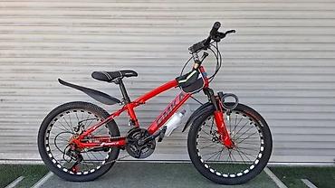 Детские велосипеды: Детский велосипед в синем цвете, оснащенный дополнительными боковыми — 10