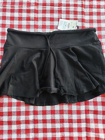 samsonite zenska torba: Crna sportska suknja-šorts (skort) - Model: suknja sa ugrađenim — 1