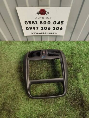 Передние фары: Центральная консоль Mazda Demio DW3W 1.3 2001 (б/у) at lalafo.kg Передние фары: Центральная консоль Mazda Demio DW3W 1.3 2001 (б/у)