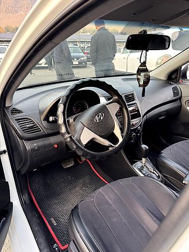 е 211: Hyundai Solaris: 2013 г., 1.6 л, Автомат, Бензин, Седан — 9