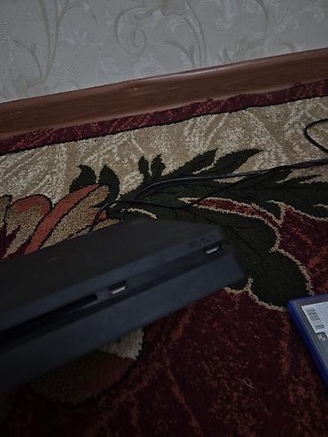 PlayStation 4 Slim, 512 ГБ. В комплекте: - 2 оригинальных геймпада — 7