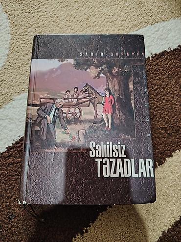 ovçu dəsti: Məhsul: Kitablar və portfel dəsti 1) Kitab: “Kriz Ekonomisi: Dünya — 3