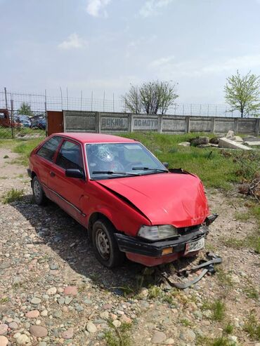 авариные машины: Mazda 323: 1988 г., 1.4 л, Механика, Бензин, Купе