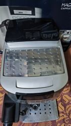 Qəhvə maşınları: Qəhvə maşını Delonghi, Avtomat, Süd qabı ilə, İşlənmiş — 1