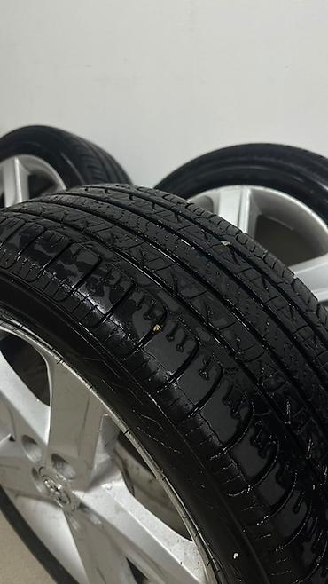 21570 р16: Комплект из 4 колес Toyota: литые диски + шины. - Диски: оригинальные — 3
