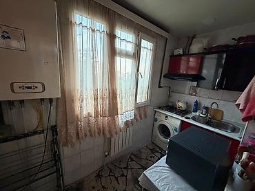 divar refleri: Ev satilir. 2 otagli ev 3 peredelka olunmuş. Kombisi var, senedleri — 7