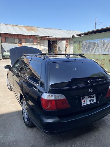 жукили: Nissan Primera: 2000 г., 1.8 л, Механика, Бензин, Универсал — 7