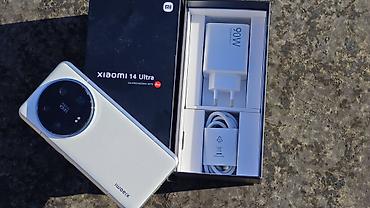 купить сяоми 12: Xiaomi 14 Ultra, 512 ГБ, цвет - Белый, 
 Гарантия — 6