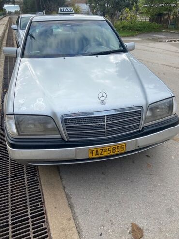 Transport: Mercedes-Benz C 250: 2.5 l | 1996 year Limousine