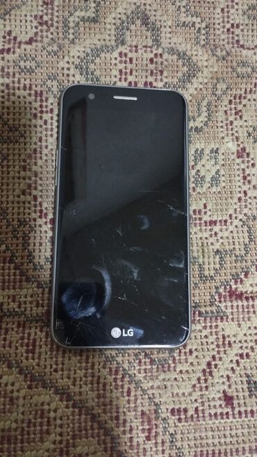 LG: LG K10, 16 GB, rəng - Gümüşü, Sensor, Barmaq izi, İki sim kartlı