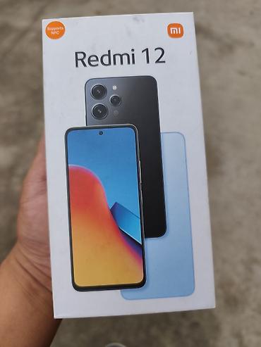 юан плюс: Redmi, Redmi 12, Б/у, 256 ГБ, цвет - Голубой, 2 SIM — 4